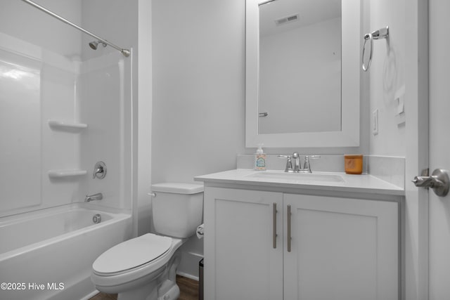 7801 Harrier Cir, Leland, NC 28451 - bathroom featuring visible vents, shower / washtub combination, toilet, vanity, and wood finished floors