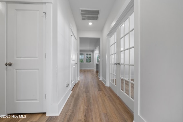 7801 Harrier Cir, Leland, NC 28451 - hall featuring recessed lighting, visible vents, baseboards, and wood finished floors