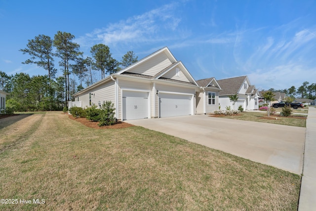 7801 Harrier Cir, Leland, NC 28451 - view of home's exterior with a yard, an attached garage, and concrete driveway