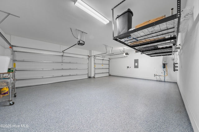 7801 Harrier Cir, Leland, NC 28451 - garage with electric panel, baseboards, and a garage door opener