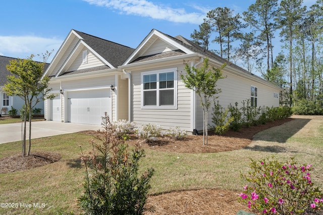 7801 Harrier Cir, Leland, NC 28451 - ranch-style home with concrete driveway, a garage, and a front lawn