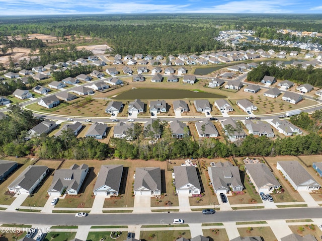 7801 Harrier Cir, Leland, NC 28451 - drone / aerial view featuring a forest view and a residential view