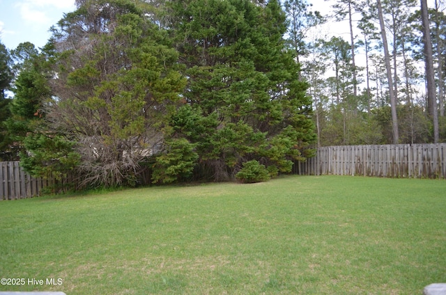 view of yard with fence
