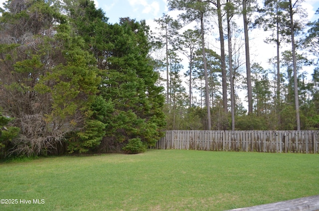 view of yard with fence