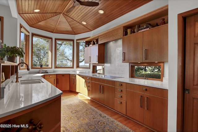 1409 Landfall Dr, Wilmington, NC 28405 - kitchen with a sink, wood ceiling, open shelves, ceiling fan, and light wood-type flooring