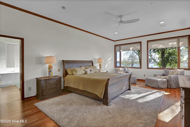 1409 Landfall Dr, Wilmington, NC 28405 - bedroom with ornamental molding, baseboards, wood finished floors, recessed lighting, and ensuite bathroom