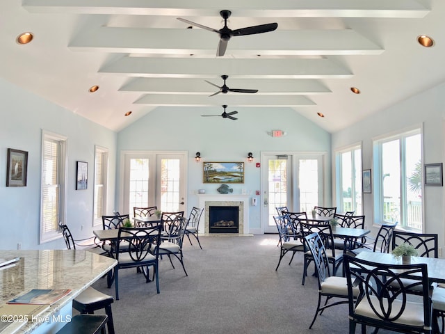 1462 Pinecroft Ln SE, Bolivia, NC 28422 - dining room with a fireplace with flush hearth, light carpet, ceiling fan, recessed lighting, and plenty of natural light