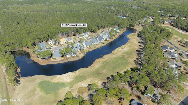 1462 Pinecroft Ln SE, Bolivia, NC 28422 - aerial overview of property's location with a heavily wooded area, a large body of water, a golf course, and nearby suburban area