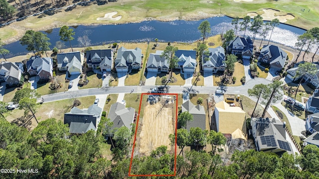 1462 Pinecroft Ln SE, Bolivia, NC 28422 - aerial view of residential area with a golf course, a nearby body of water, and property parcel outlined