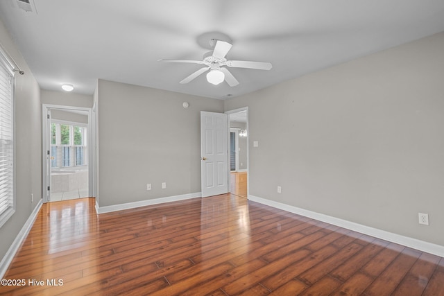 424 Commerce Ave Unit B, Morehead City, NC 28557 - spare room featuring baseboards, wood finished floors, and ceiling fan