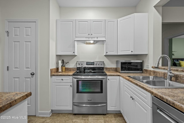 kitchen with white cabinetry, a sink, appliances with stainless steel finishes, and under cabinet range hood