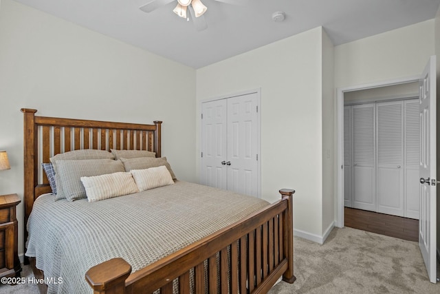 carpeted bedroom featuring baseboards and ceiling fan