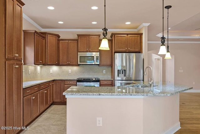4021 Alastaire Cv, Leland, NC 28451 - kitchen featuring brown cabinetry, ornamental molding, a sink, and appliances with stainless steel finishes