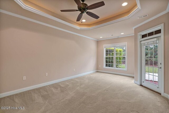 4021 Alastaire Cv, Leland, NC 28451 - unfurnished room featuring ceiling fan, carpet floors, a raised ceiling, baseboards, and visible vents