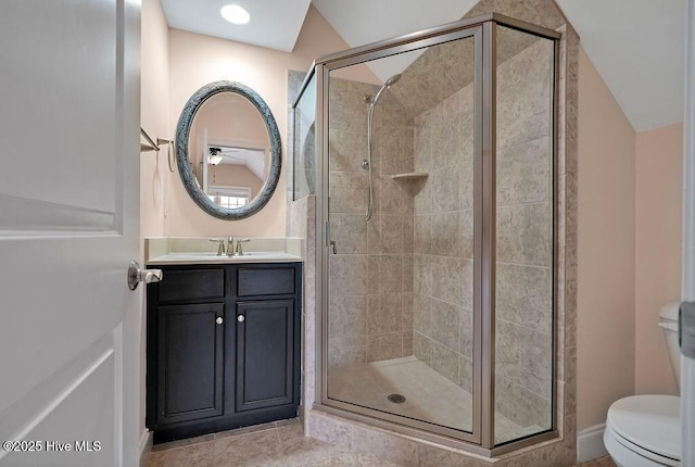4021 Alastaire Cv, Leland, NC 28451 - bathroom with vaulted ceiling, a shower stall, toilet, and vanity