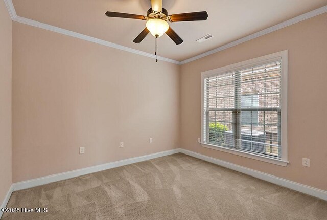 4021 Alastaire Cv, Leland, NC 28451 - empty room with light carpet, baseboards, visible vents, and ornamental molding