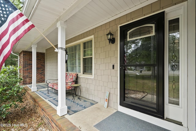 211 E 11th St, Southport, NC 28461 - doorway to property with covered porch