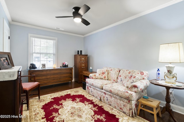 211 E 11th St, Southport, NC 28461 - living area with wood finished floors, ornamental molding, ceiling fan, and baseboards