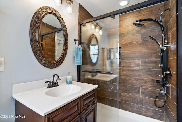 211 E 11th St, Southport, NC 28461 - bathroom featuring vanity and a shower stall