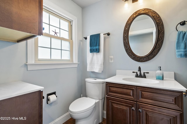 211 E 11th St, Southport, NC 28461 - bathroom with vanity and toilet
