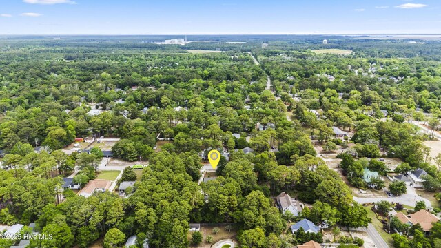 211 E 11th St, Southport, NC 28461 - aerial overview of property's location featuring a heavily wooded area