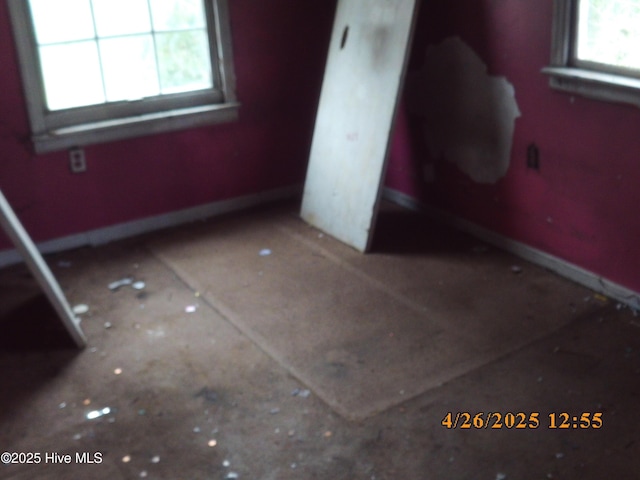 unfurnished bedroom featuring baseboards