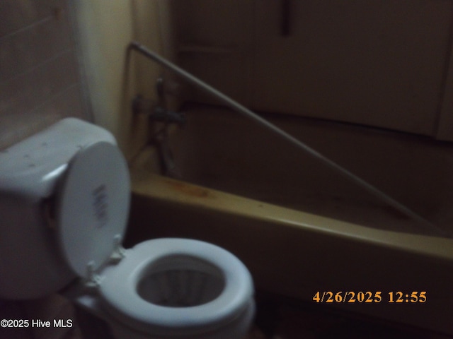 bathroom featuring toilet