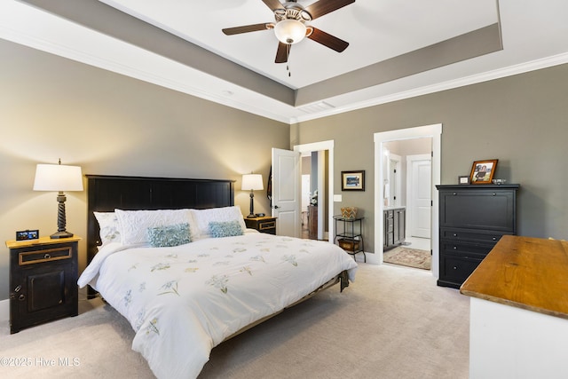 1443 Ellsworth Dr SW, Ocean Isle Beach, NC 28469 - bedroom featuring light carpet, a raised ceiling, ornamental molding, ceiling fan, and ensuite bath