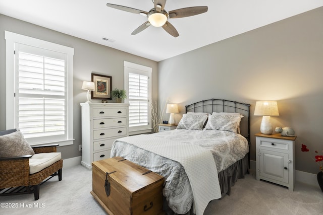 1443 Ellsworth Dr SW, Ocean Isle Beach, NC 28469 - bedroom featuring light colored carpet, baseboards, and a ceiling fan