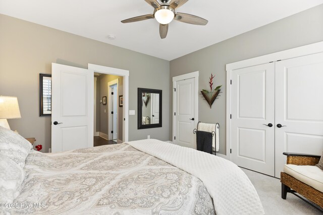1443 Ellsworth Dr SW, Ocean Isle Beach, NC 28469 - bedroom with a closet, a ceiling fan, and light colored carpet