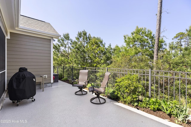 1443 Ellsworth Dr SW, Ocean Isle Beach, NC 28469 - view of patio / terrace with a balcony and area for grilling