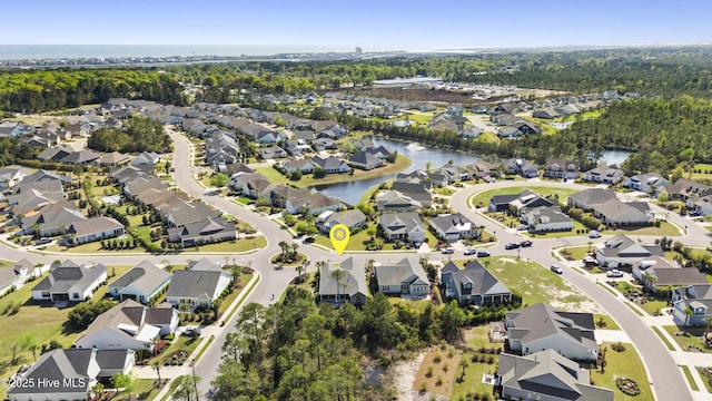 1443 Ellsworth Dr SW, Ocean Isle Beach, NC 28469 - aerial view of property and surrounding area featuring nearby suburban area and a nearby body of water