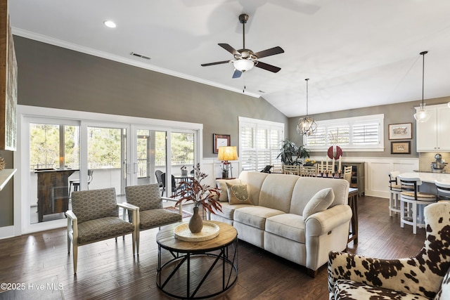 1443 Ellsworth Dr SW, Ocean Isle Beach, NC 28469 - living area featuring a ceiling fan, dark wood-style floors, ornamental molding, a chandelier, and recessed lighting