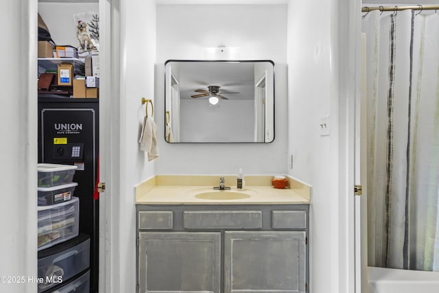 bathroom featuring ceiling fan and vanity