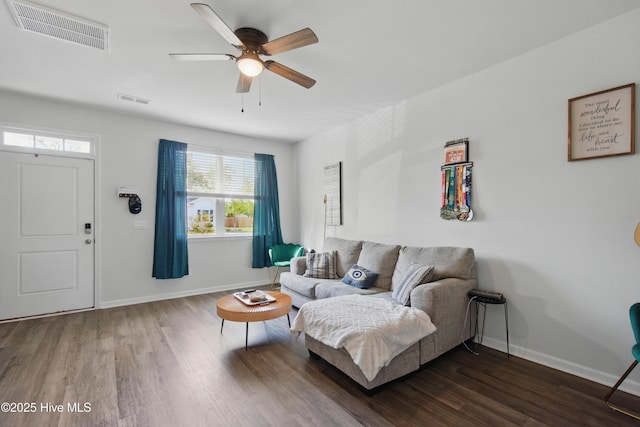 1550 Murre Ct SE, Bolivia, NC 28422 - living room with wood finished floors, a ceiling fan, and baseboards
