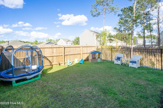 1550 Murre Ct SE, Bolivia, NC 28422 - view of yard featuring a trampoline and a residential view