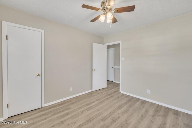 1317 Old Grantham Rd, Goldsboro, NC 27530 - unfurnished bedroom featuring wood finished floors and a ceiling fan