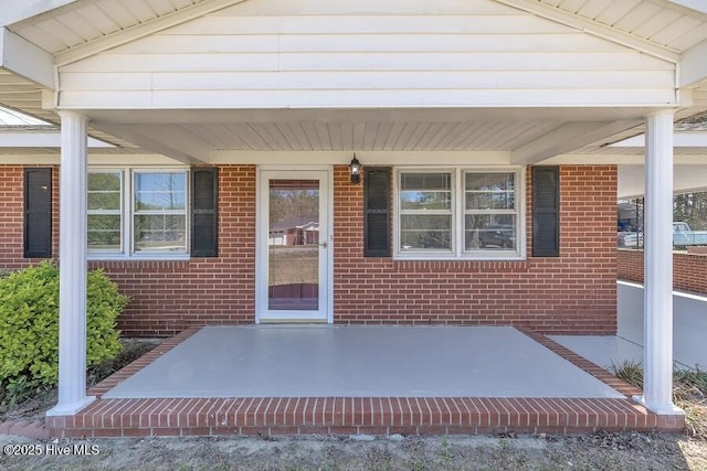 1317 Old Grantham Rd, Goldsboro, NC 27530 - entrance to property with brick siding and a porch