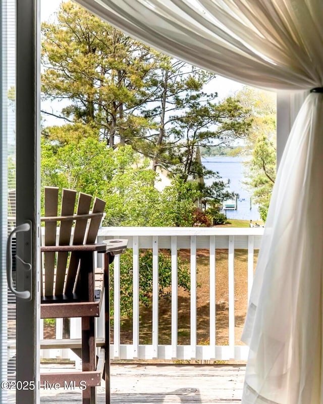 8713 Emerald Plantation Rd, Emerald Isle, NC 28594 - balcony featuring a water view