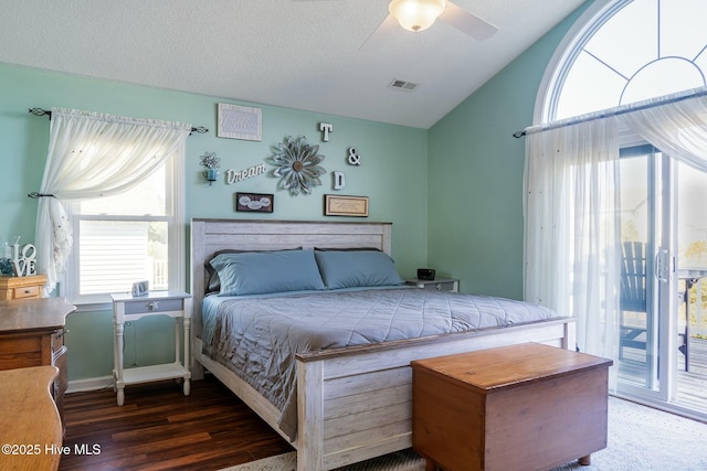 8713 Emerald Plantation Rd, Emerald Isle, NC 28594 - bedroom with lofted ceiling, wood finished floors, multiple windows, ceiling fan, and access to outside