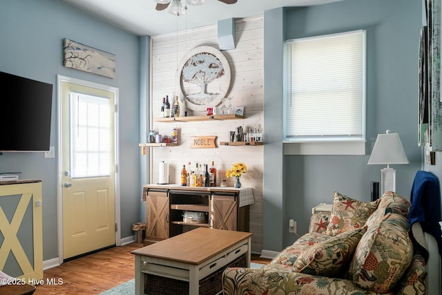 8713 Emerald Plantation Rd, Emerald Isle, NC 28594 - bar with a ceiling fan and wood finished floors