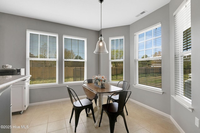 117 NW River Dr, Moyock, NC 27958 - sunroom / solarium featuring a healthy amount of sunlight, tile patterned floors, and lofted ceiling