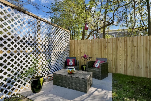 view of patio / terrace with fence