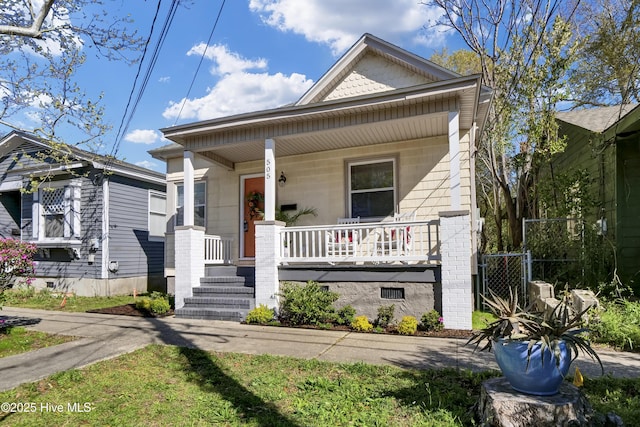 bungalow-style house with crawl space and a porch