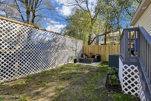 view of yard featuring a fenced backyard