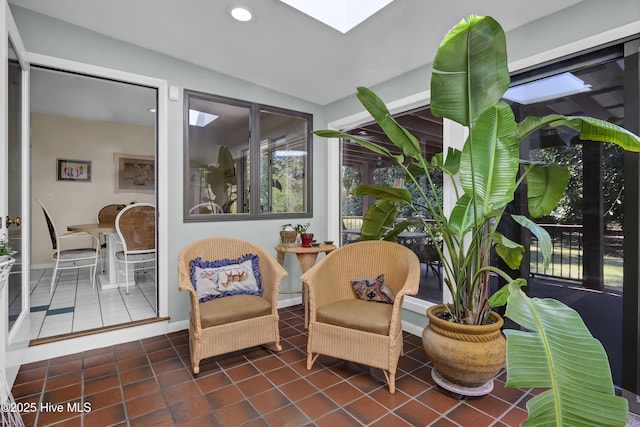 sunroom / solarium with a skylight