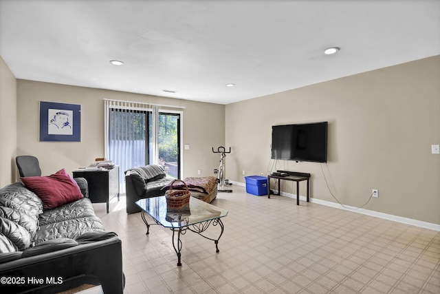 living room featuring baseboards, visible vents, recessed lighting, and light floors
