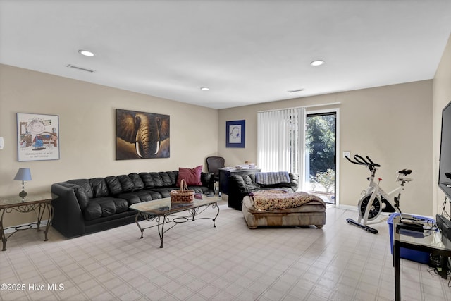 living area featuring light floors, recessed lighting, and visible vents