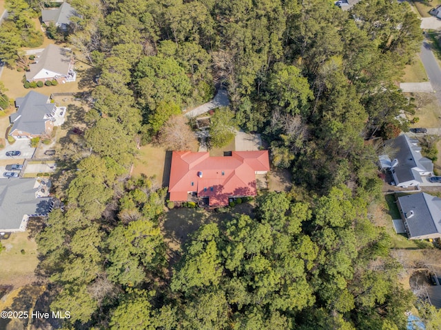 bird's eye view with a residential view and a view of trees