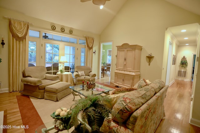 living room with ceiling fan, baseboards, recessed lighting, wood finished floors, and high vaulted ceiling